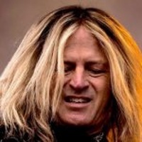 Doug Aldrich -Guitare -